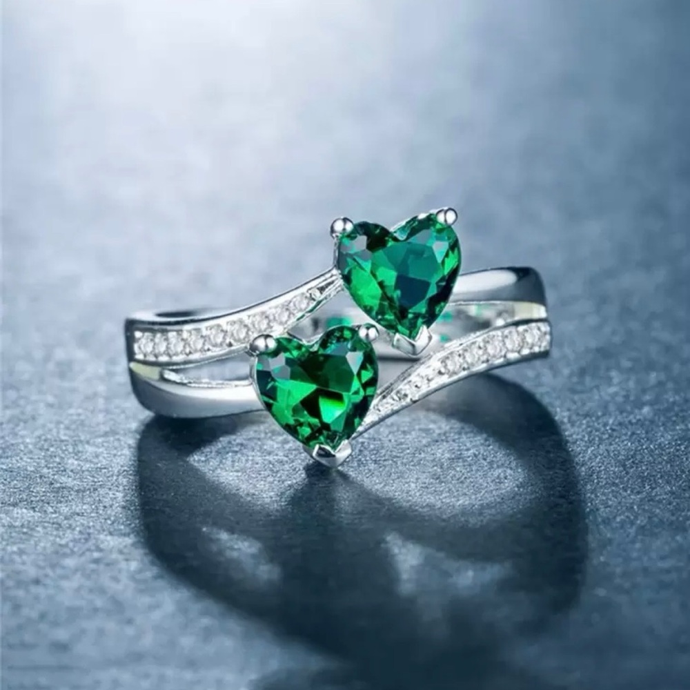 Elegant Sterling Silver Ring with Emerald Heart Stones